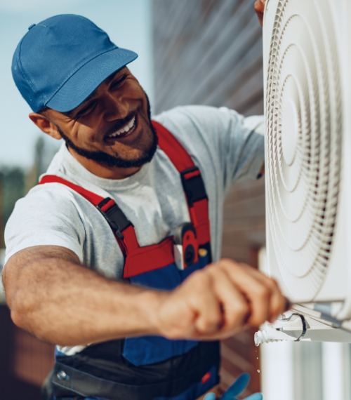 man working on an AC unit